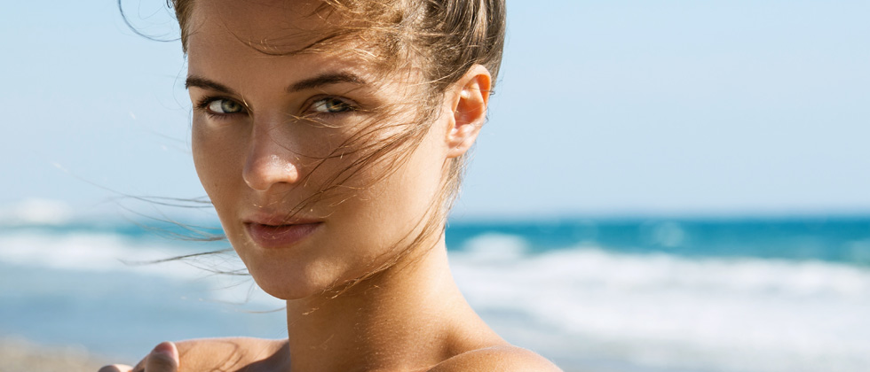 A young attractive woman looking seductively into the camera