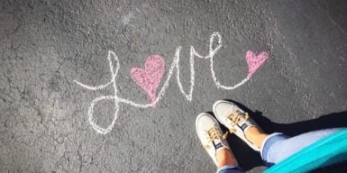 does he love me symbolized by the word love written on the street