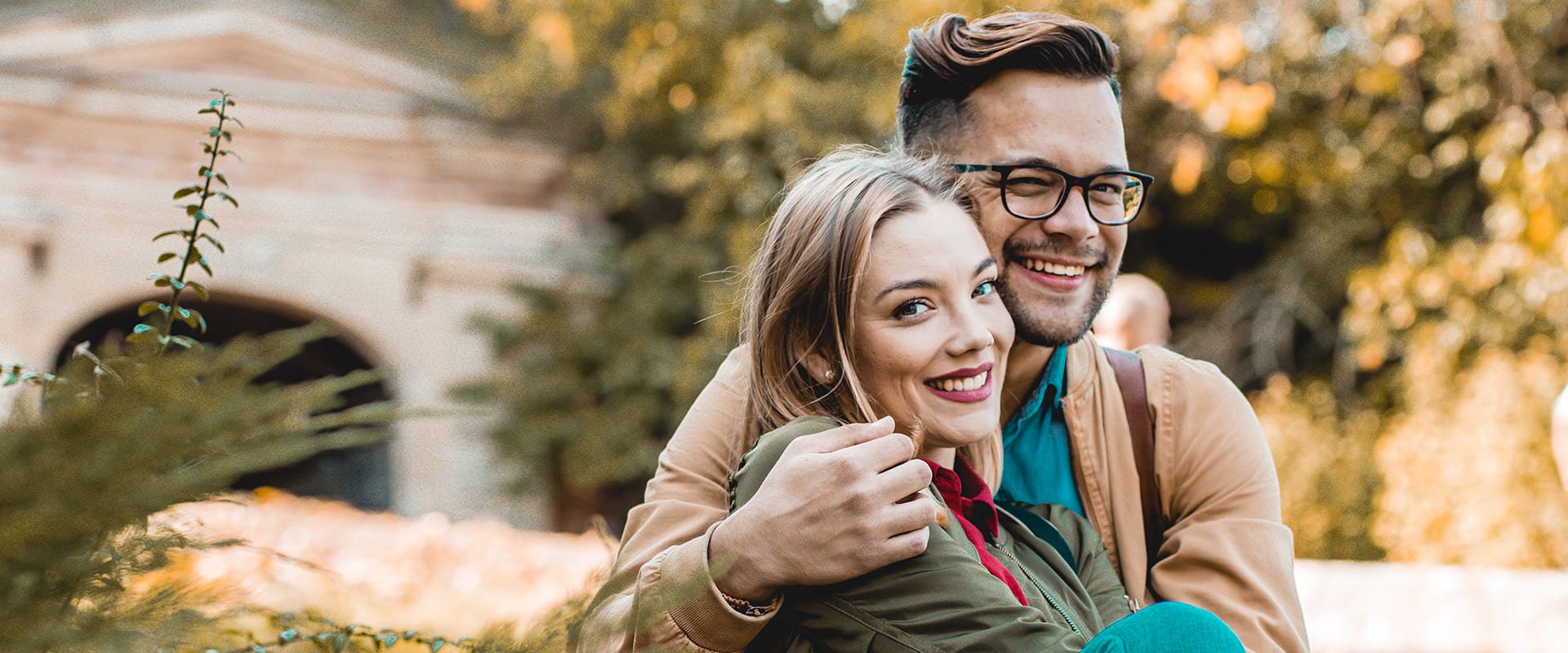 Professional dating symobolized by a couple sitting together and hugging each other