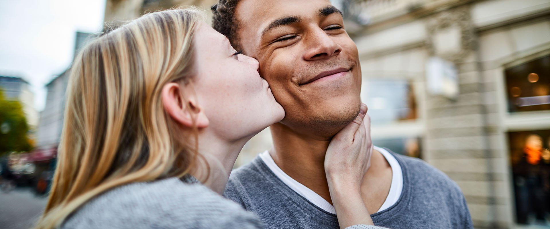 Kiss, love, romantic dating concept. Profile portrait of young