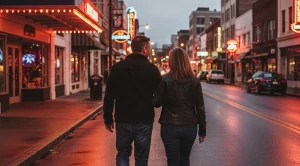 A couple strolling beale street in tennessee.