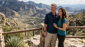 A couple in front of a canyon near catalina highway.