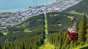 A Tram is going up the mount roberts in junea alaska.