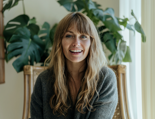 Woman is smiling to the camera